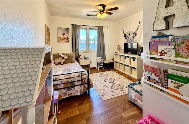 9307 Banderilla Dr, La Grange, CA 95329 - bedroom featuring dark wood-style flooring and a ceiling fan