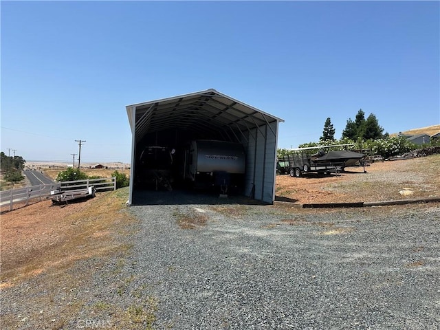9307 Banderilla Dr, La Grange, CA 95329 - view of outbuilding featuring gravel driveway and a carport