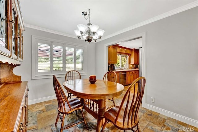 3595 Sego St, Irvine, CA 92606 - dining area with stone tile floors, a chandelier, baseboards, and ornamental molding
