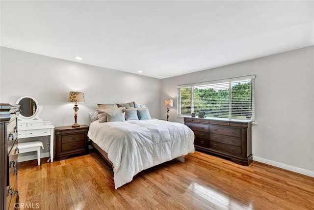 3595 Sego St, Irvine, CA 92606 - bedroom with light wood-style flooring, baseboards, and recessed lighting