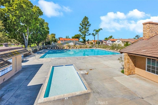 3595 Sego St, Irvine, CA 92606 - community pool featuring a patio and a residential view