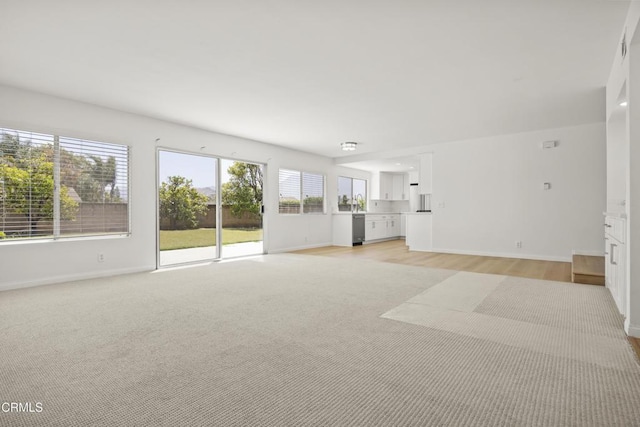 196 Mariposa Dr, Camarillo, CA 93012 - unfurnished living room with baseboards