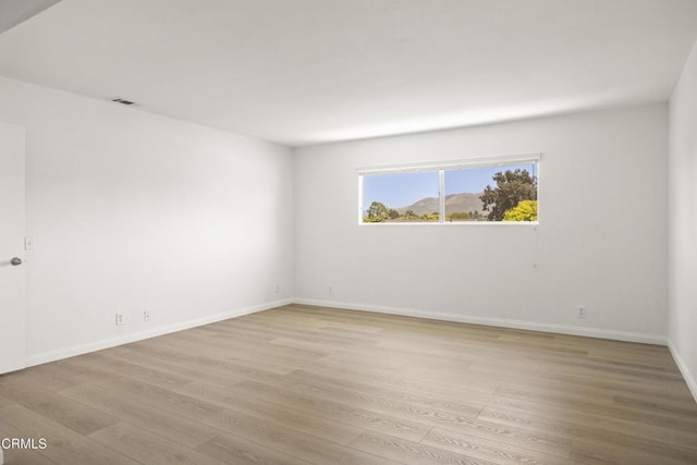 196 Mariposa Dr, Camarillo, CA 93012 - unfurnished room with light wood-style floors and baseboards