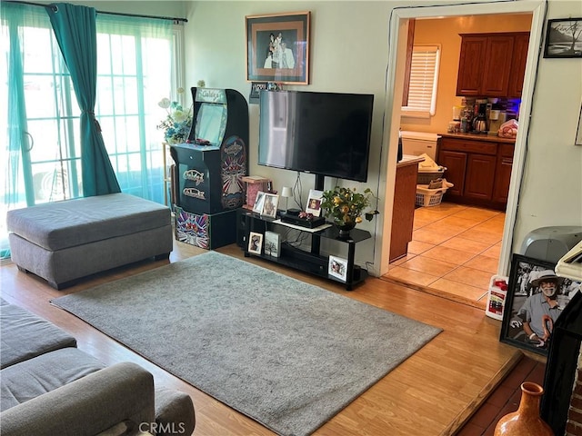 1923 W 115th St, Los Angeles, CA 90047 - living room featuring light wood finished floors