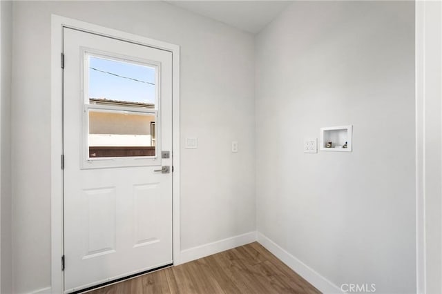 1715 E Redwood Ave, Anaheim, CA 92805 - doorway to outside with baseboards and wood finished floors