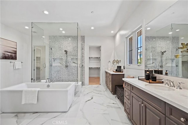51 Eider Run, Irvine, CA 92618 - full bathroom with a stall shower, vanity, a soaking tub, recessed lighting, and marble finish flooring