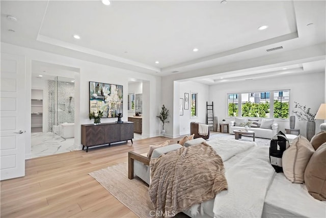 51 Eider Run, Irvine, CA 92618 - living area featuring a raised ceiling, light wood-type flooring, and recessed lighting