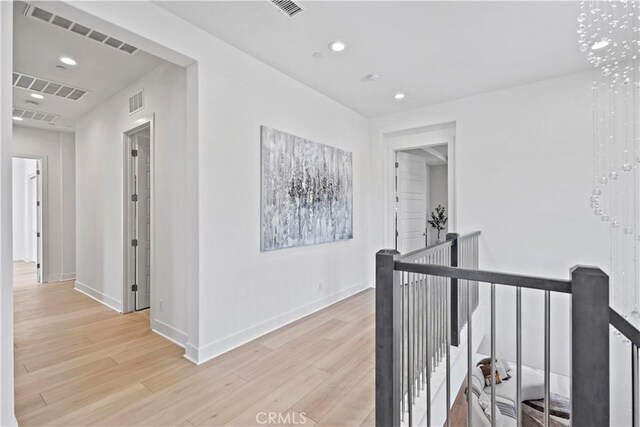 51 Eider Run, Irvine, CA 92618 - corridor featuring an upstairs landing, light wood-type flooring, and recessed lighting