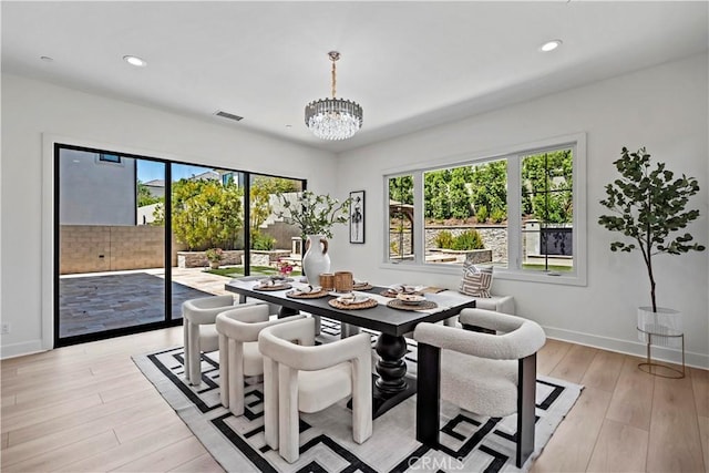51 Eider Run, Irvine, CA 92618 - dining area with light wood finished floors, recessed lighting, and a chandelier