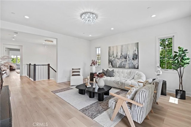 51 Eider Run, Irvine, CA 92618 - living area with light wood-style floors, recessed lighting, and a chandelier
