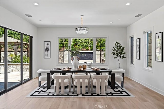 51 Eider Run, Irvine, CA 92618 - dining area featuring plenty of natural light, light wood-style flooring, recessed lighting, and a chandelier