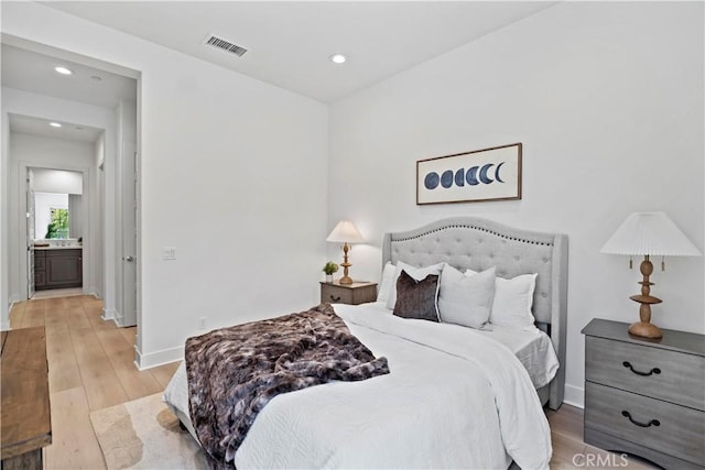 51 Eider Run, Irvine, CA 92618 - bedroom with recessed lighting and light wood finished floors