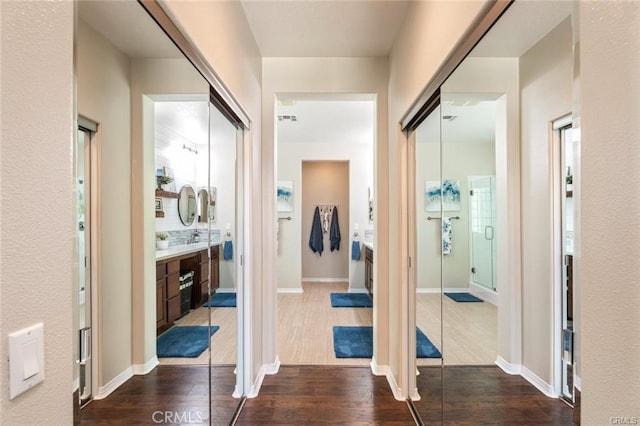 27840 Pointe Breeze Dr, Menifee, CA 92585 - hall featuring dark wood-type flooring