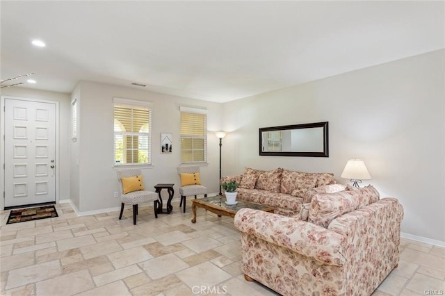 27840 Pointe Breeze Dr, Menifee, CA 92585 - living room featuring stone tile floors and recessed lighting