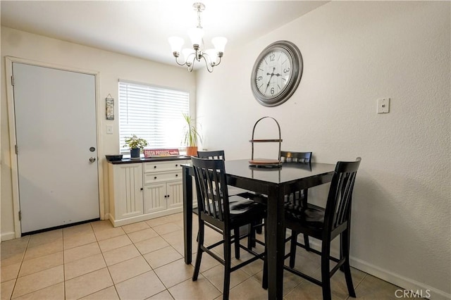 3833 Kennedy St, Le Grand, CA 95333 - dining area featuring a chandelier, baseboards, and light tile patterned floors