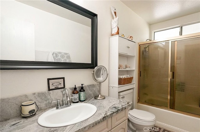 3833 Kennedy St, Le Grand, CA 95333 - full bathroom with vanity, enclosed tub / shower combo, and toilet
