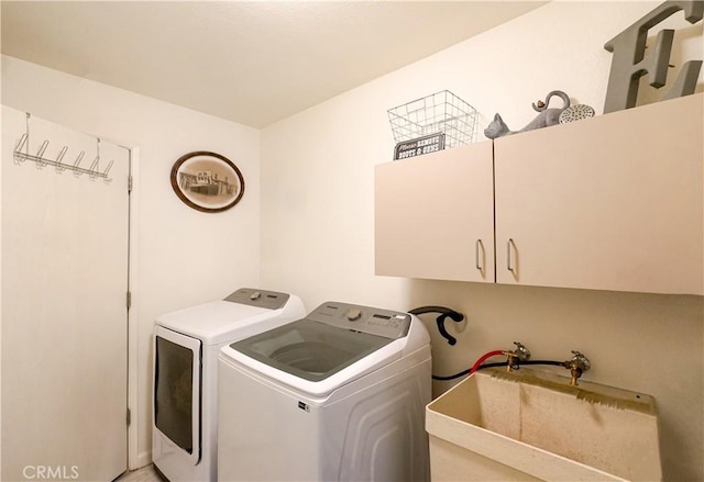 3833 Kennedy St, Le Grand, CA 95333 - laundry room featuring cabinet space and washing machine and clothes dryer