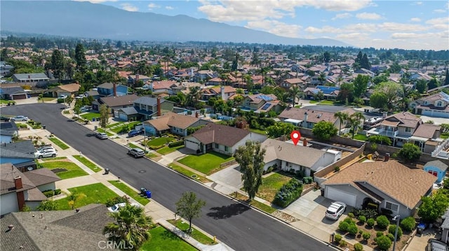 6859 Mango St, Rancho Cucamonga, CA 91701 - aerial perspective of suburban area featuring a mountain backdrop