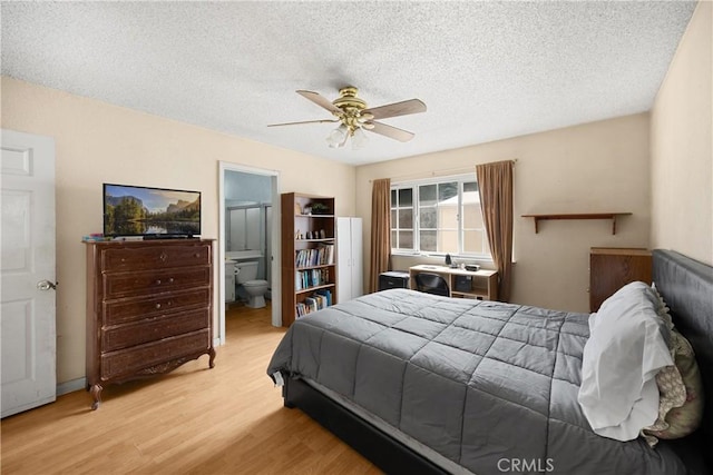 6859 Mango St, Rancho Cucamonga, CA 91701 - bedroom featuring wood finished floors, a textured ceiling, ensuite bath, and a ceiling fan