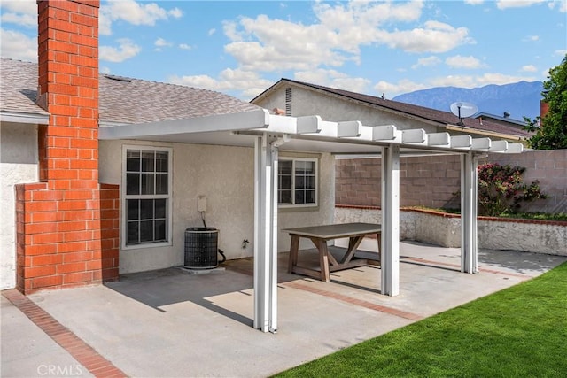 6859 Mango St, Rancho Cucamonga, CA 91701 - view of patio featuring a mountain view and a pergola