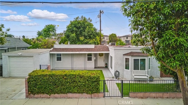 4819 Church St, Pico Rivera, CA 90660 - view of front of home featuring a fenced front yard, stucco siding, a garage, covered porch, and driveway