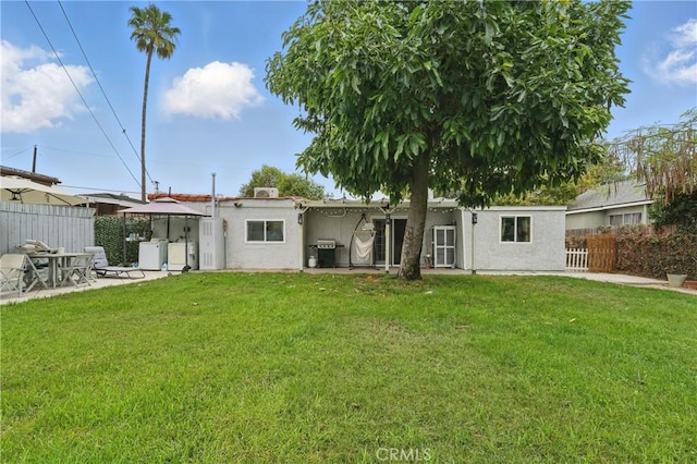 4819 Church St, Pico Rivera, CA 90660 - rear view of house with a patio area and stucco siding