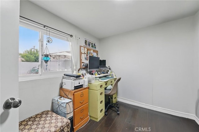 4819 Church St, Pico Rivera, CA 90660 - home office with dark wood-style floors and baseboards