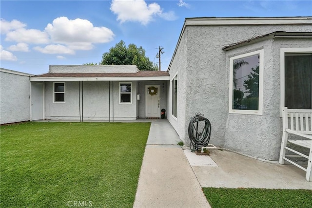 4819 Church St, Pico Rivera, CA 90660 - view of front of home featuring stucco siding and a front lawn