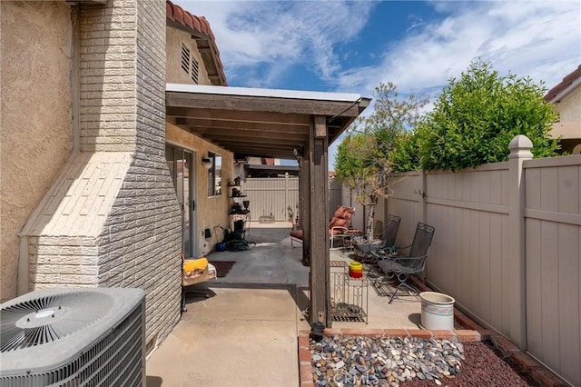 26181 Goldenwood St, Menifee, CA 92586 - fenced backyard with a patio and central AC unit