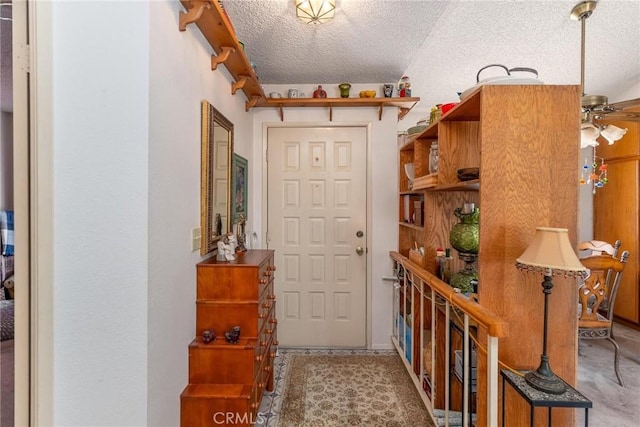 26181 Goldenwood St, Menifee, CA 92586 - foyer featuring a textured ceiling and ceiling fan