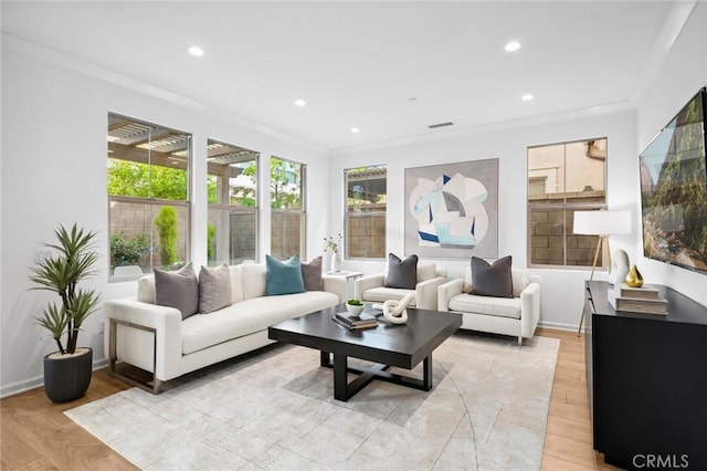 156 Barrow, Irvine, CA 92620 - living room featuring ornamental molding, light wood-type flooring, recessed lighting, and baseboards