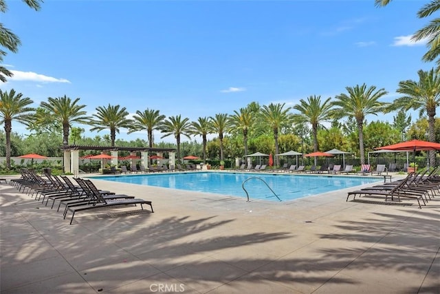 156 Barrow, Irvine, CA 92620 - community pool featuring a patio area and view of wooded area