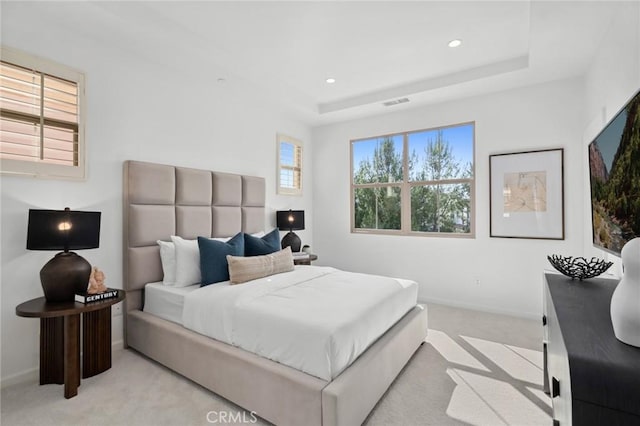 156 Barrow, Irvine, CA 92620 - bedroom featuring light carpet, baseboards, recessed lighting, and a tray ceiling