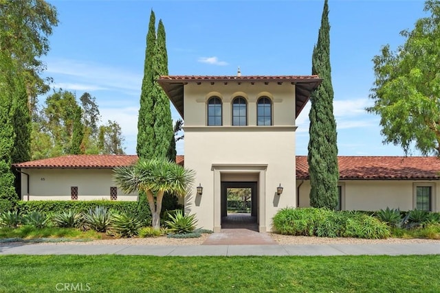 156 Barrow, Irvine, CA 92620 - mediterranean / spanish house featuring stucco siding and a front yard