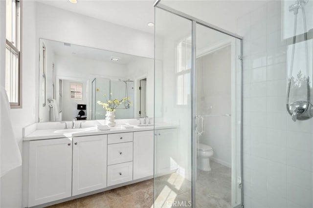 156 Barrow, Irvine, CA 92620 - bathroom featuring a stall shower, toilet, and double vanity