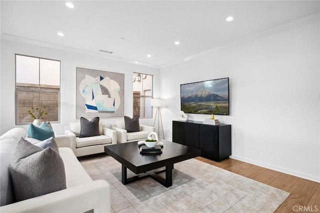 156 Barrow, Irvine, CA 92620 - living room with recessed lighting, light wood-type flooring, crown molding, and baseboards