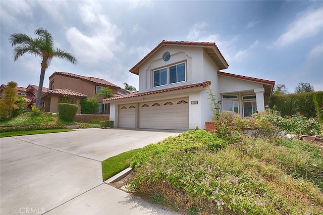 24650 Via Melinda, Yorba Linda, CA 92887 - mediterranean / spanish-style home featuring stucco siding, a garage, driveway, and a tile roof