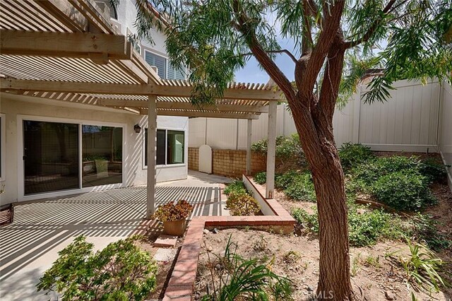 24650 Via Melinda, Yorba Linda, CA 92887 - fenced backyard featuring a patio area and a pergola