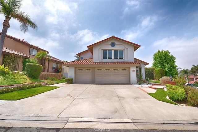 24650 Via Melinda, Yorba Linda, CA 92887 - mediterranean / spanish-style home featuring stucco siding, a tiled roof, driveway, and a garage