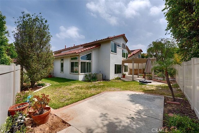 24650 Via Melinda, Yorba Linda, CA 92887 - rear view of house with a patio area, stucco siding, a tiled roof, and a pergola