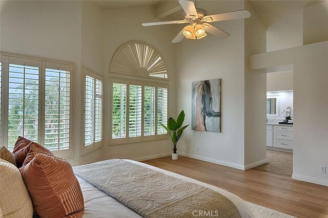24650 Via Melinda, Yorba Linda, CA 92887 - bedroom featuring high vaulted ceiling, light wood-style floors, baseboards, a ceiling fan, and beamed ceiling