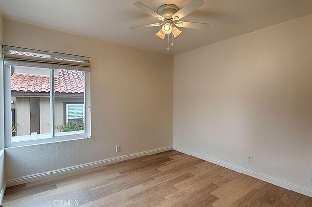 24650 Via Melinda, Yorba Linda, CA 92887 - empty room featuring wood finished floors, a ceiling fan, and baseboards