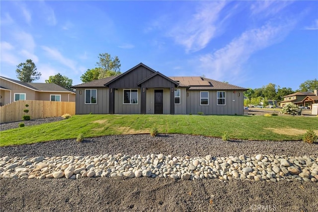 5399 Hickory Way, Paradise, CA 95969 - rear view of house featuring board and batten siding and solar panels