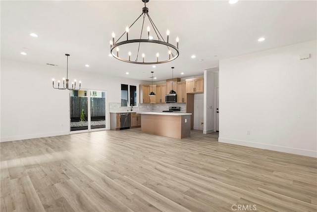 5399 Hickory Way, Paradise, CA 95969 - kitchen with a chandelier, open floor plan, recessed lighting, appliances with stainless steel finishes, and light wood-style flooring