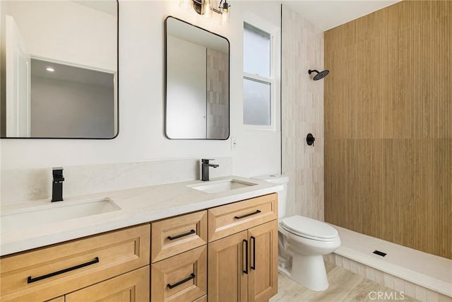 5399 Hickory Way, Paradise, CA 95969 - full bathroom featuring toilet, double vanity, tiled shower, and wood finished floors