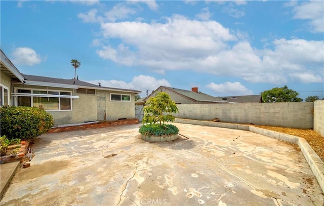 7236 Hellman Ave, Rancho Cucamonga, CA 91701 - fenced backyard featuring a patio area