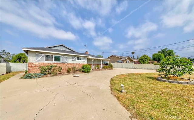 7236 Hellman Ave, Rancho Cucamonga, CA 91701 - view of front facade featuring brick siding and driveway