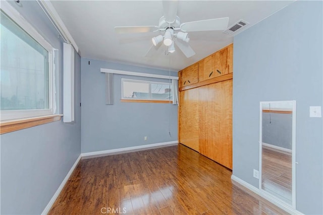 7236 Hellman Ave, Rancho Cucamonga, CA 91701 - unfurnished bedroom with wood finished floors, baseboards, a closet, and ceiling fan