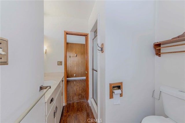 7236 Hellman Ave, Rancho Cucamonga, CA 91701 - full bath with vanity, toilet, wood finished floors, and a shower with door