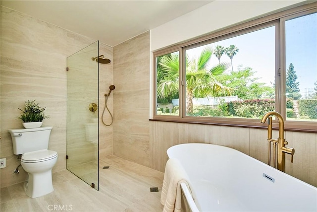 9539 Gladbeck Ave, Northridge, CA 91324 - bathroom with healthy amount of natural light, a freestanding tub, toilet, and walk in shower